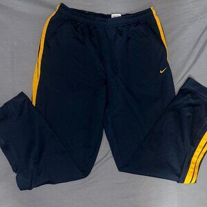 Vintage 1990s Nike Men’s Blue and Yellow Track Pants with Ankle Zip - Size XXL